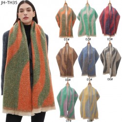 The new style of scarves from the manufacturer are selling well across borders. Wholesale of loop yarn jacquard scarves and shawls for autumn and winter in Europe and America